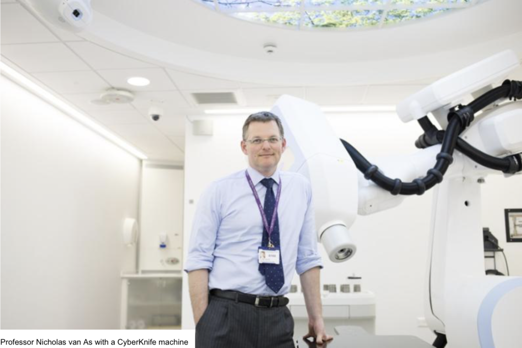Professor Nicholas van As with a CyberKnife machine