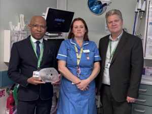 l-r Consultant Breast Surgeon Mr Abdalla Saad Abdalla, Heidi and Mr Wayne Chicken