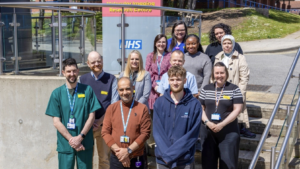 James Hargraves, left in the green scrubs, with just some of the team involved in the Radiopharmacy Suite at the Molecular Imaging Research Centre