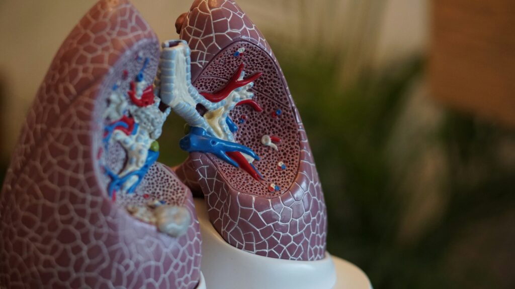 A patient at Clatterbridge is the first person in the world to be given a pioneering cancer vaccine for the most common type of lung cancer.