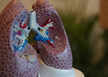 A patient at Clatterbridge is the first person in the world to be given a pioneering cancer vaccine for the most common type of lung cancer.
