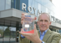 Professor Rintoul holding an NIHR Impact Prize 2026 'commended' trophy